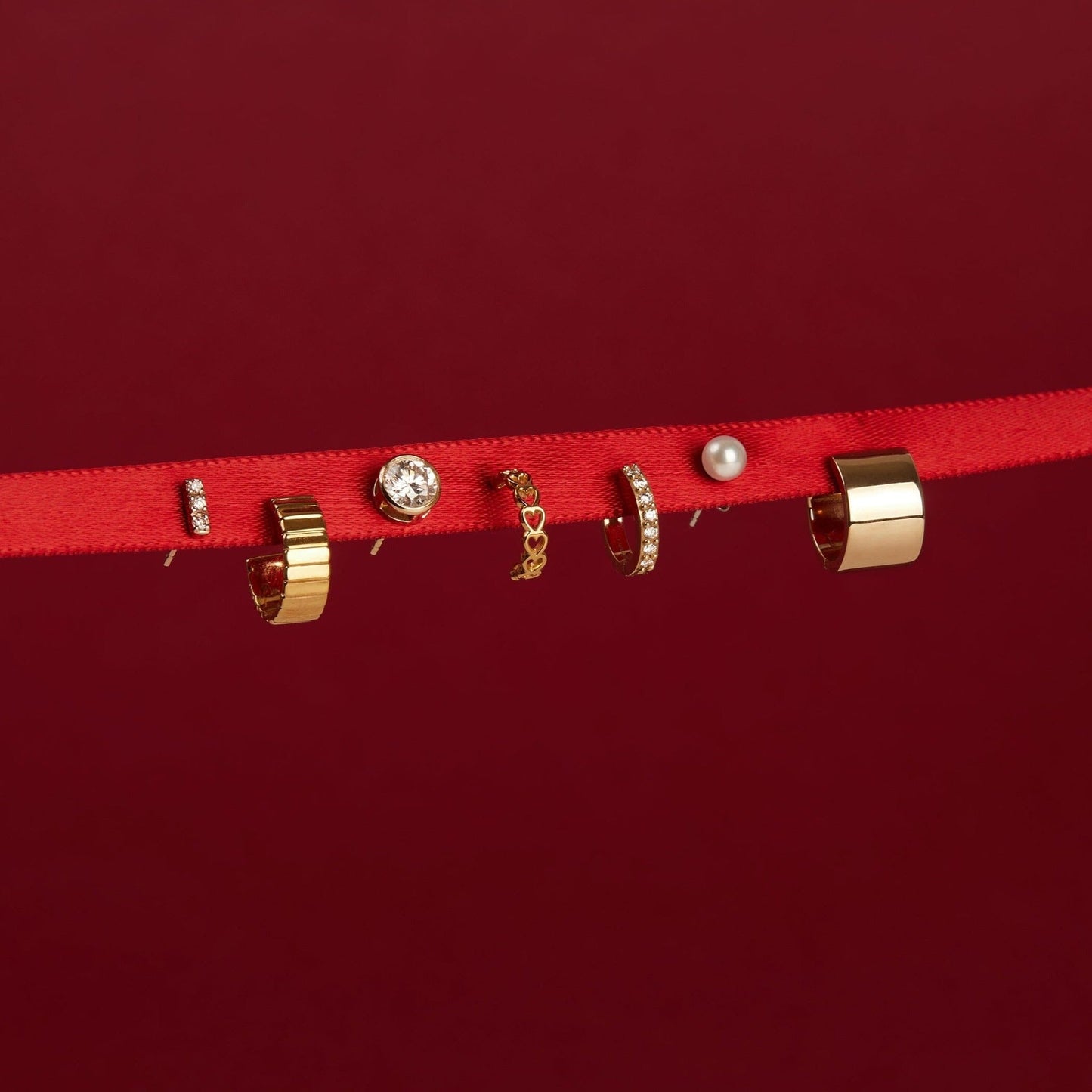 Infinity Huggie Earrings