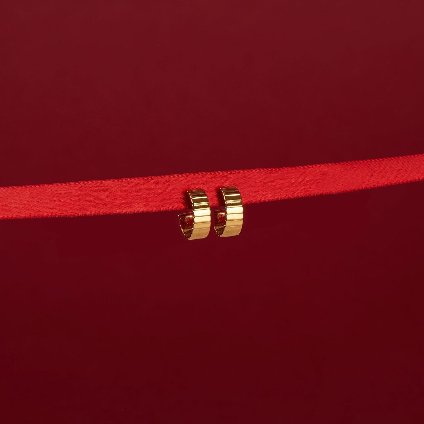 Infinity Huggie Earrings