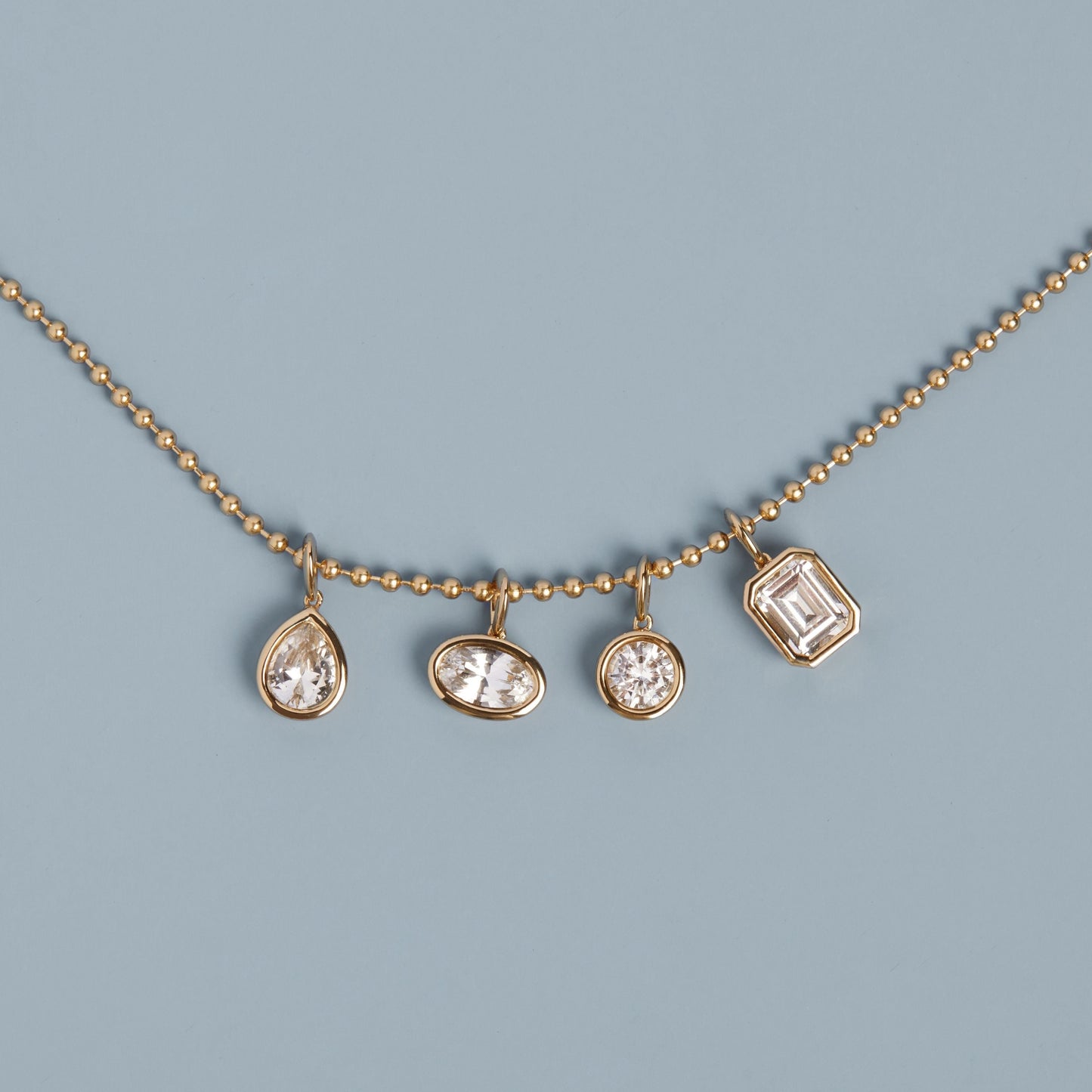 Round Lab Grown White Sapphire Bezel Pendant