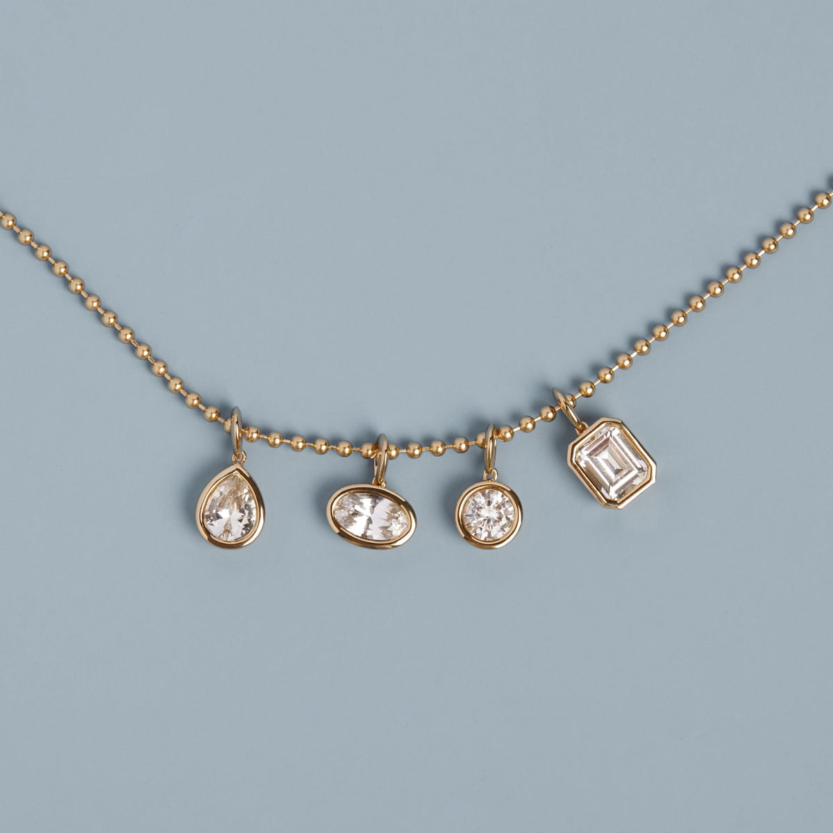 Round Lab Grown White Sapphire Bezel Pendant